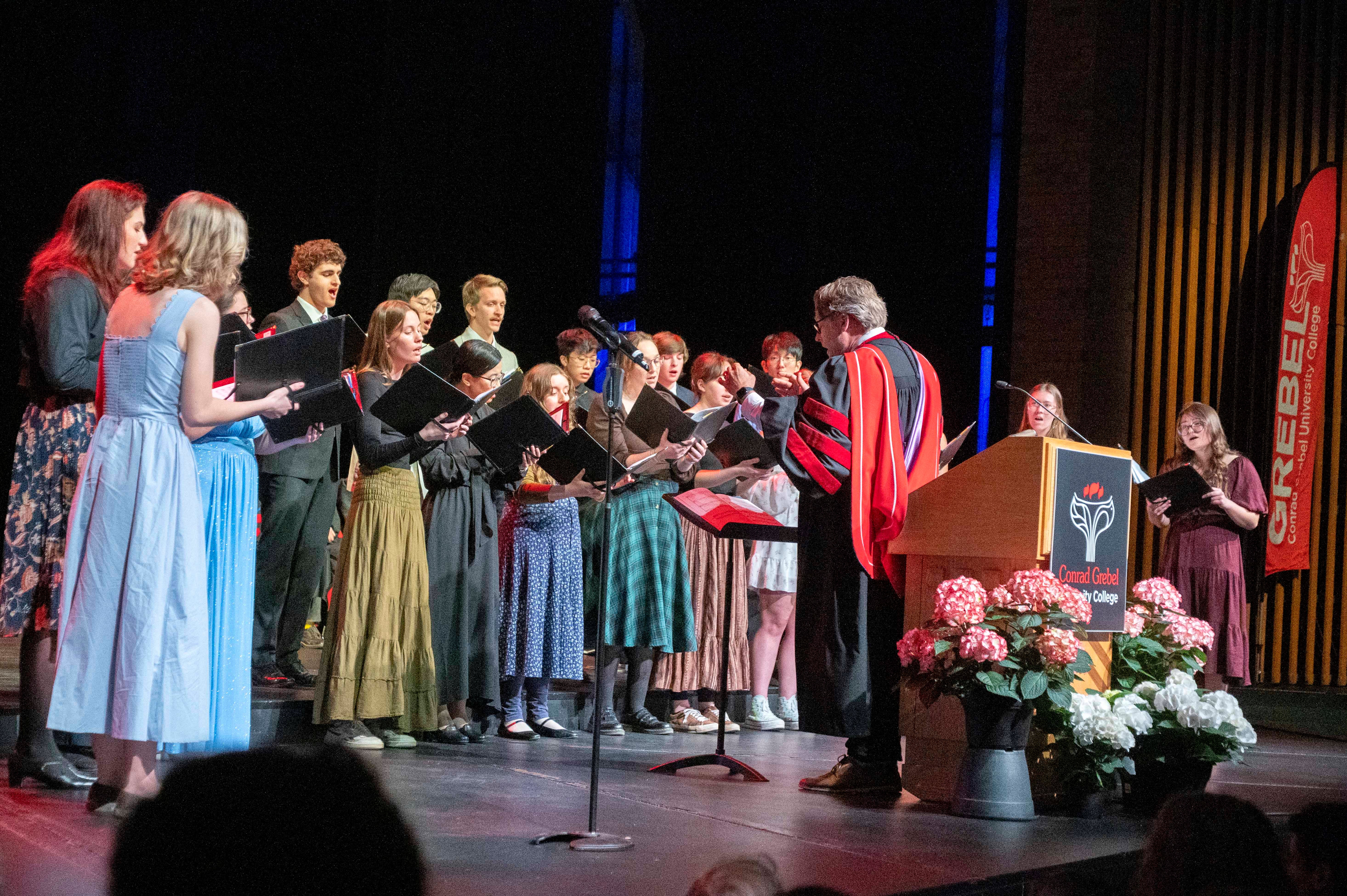 Choir singing under the direction of Mark Vuorinen