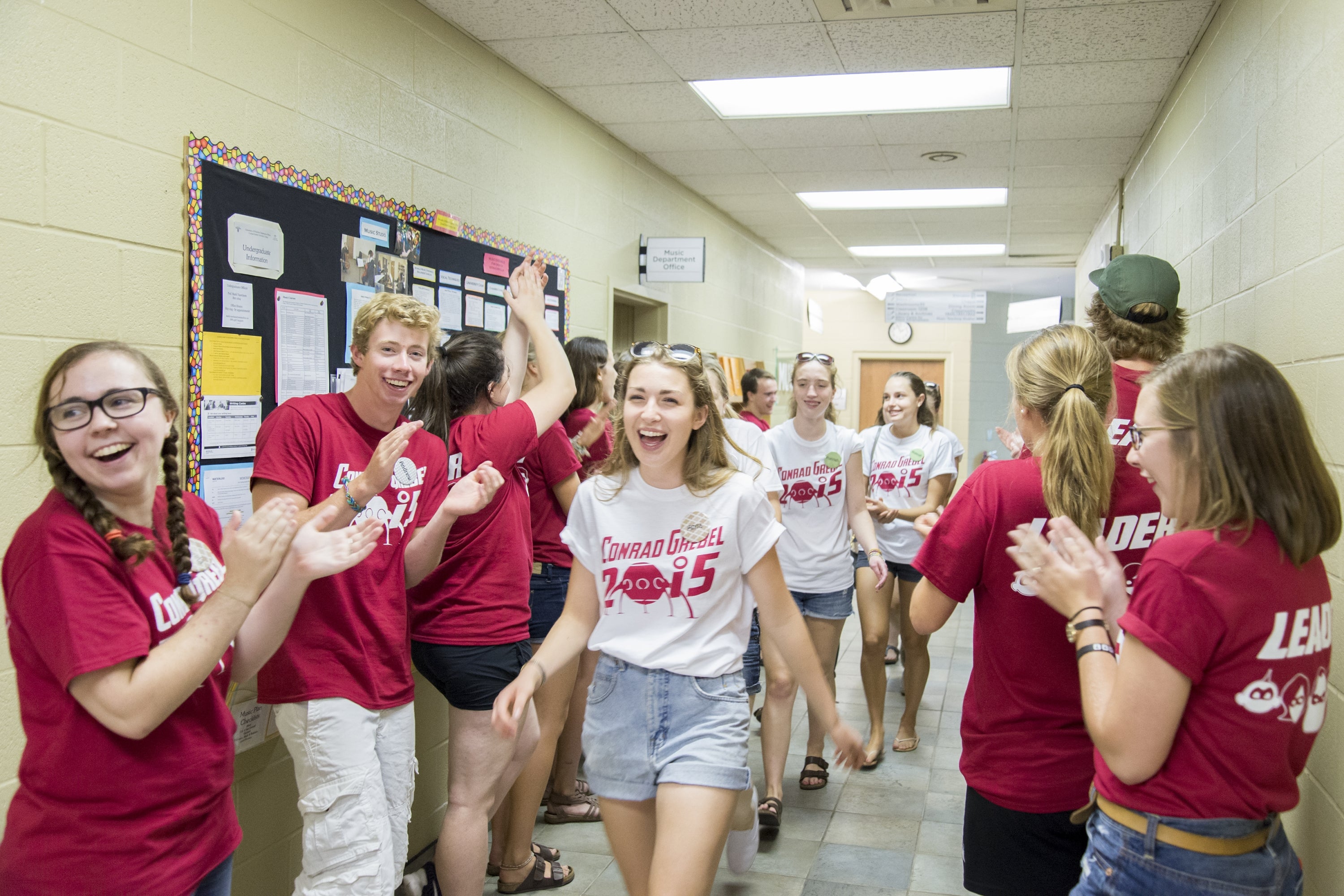 team leaders clapping for the new students