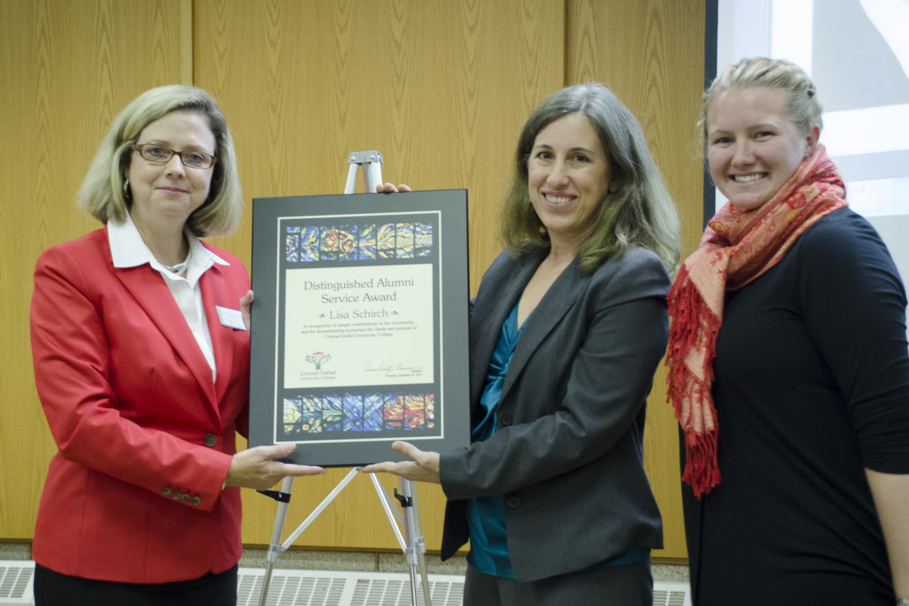 Lisa Schirch recieving the award