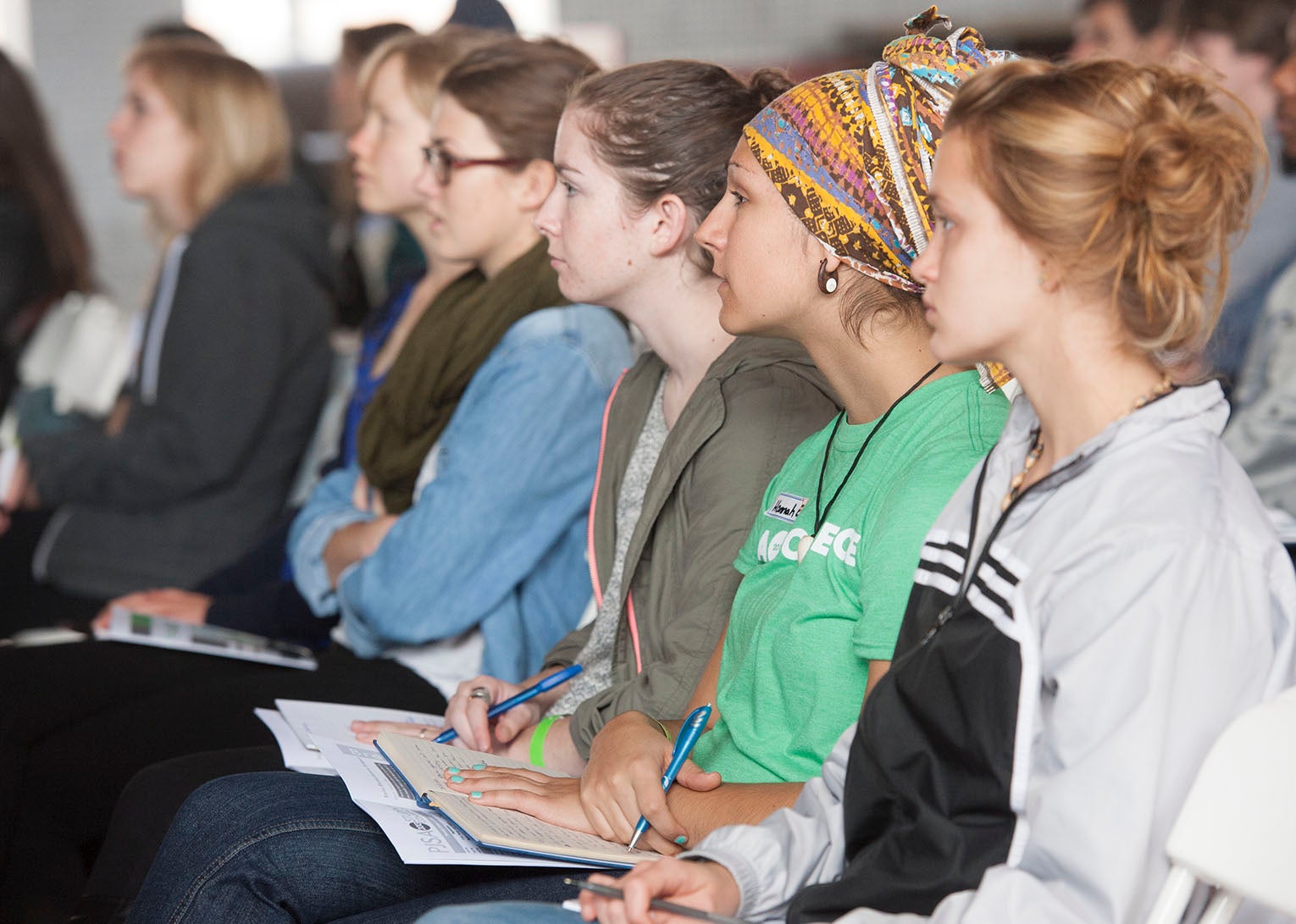 Students listening to a speaker