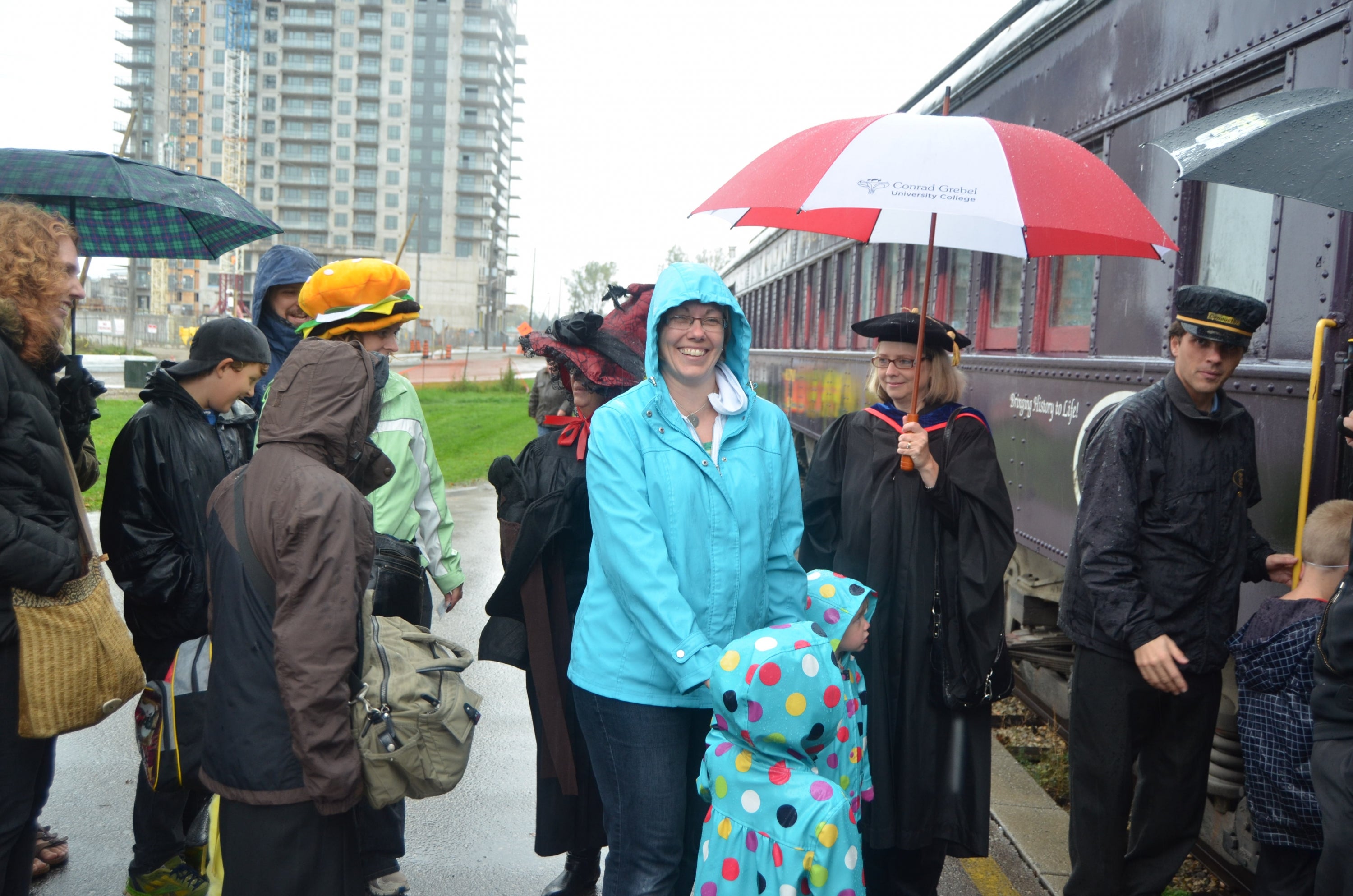 people getting on a train