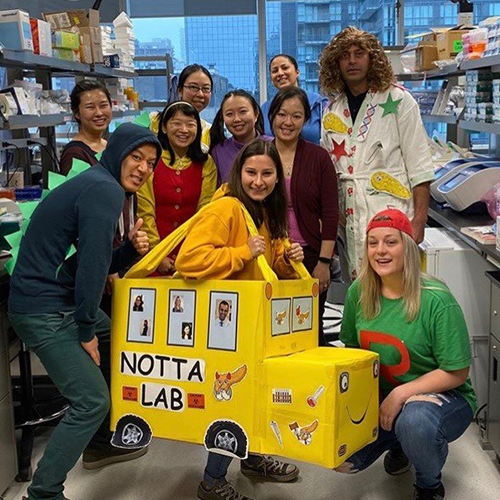group halloween costume in a science lab