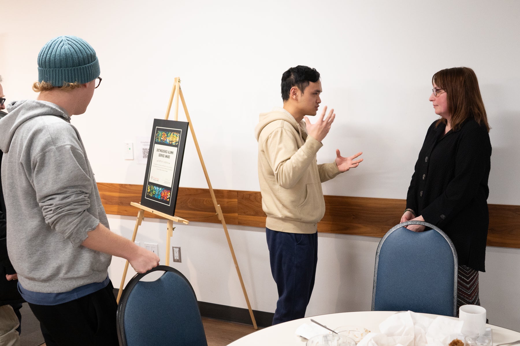 Kathryn Ladano talking to student