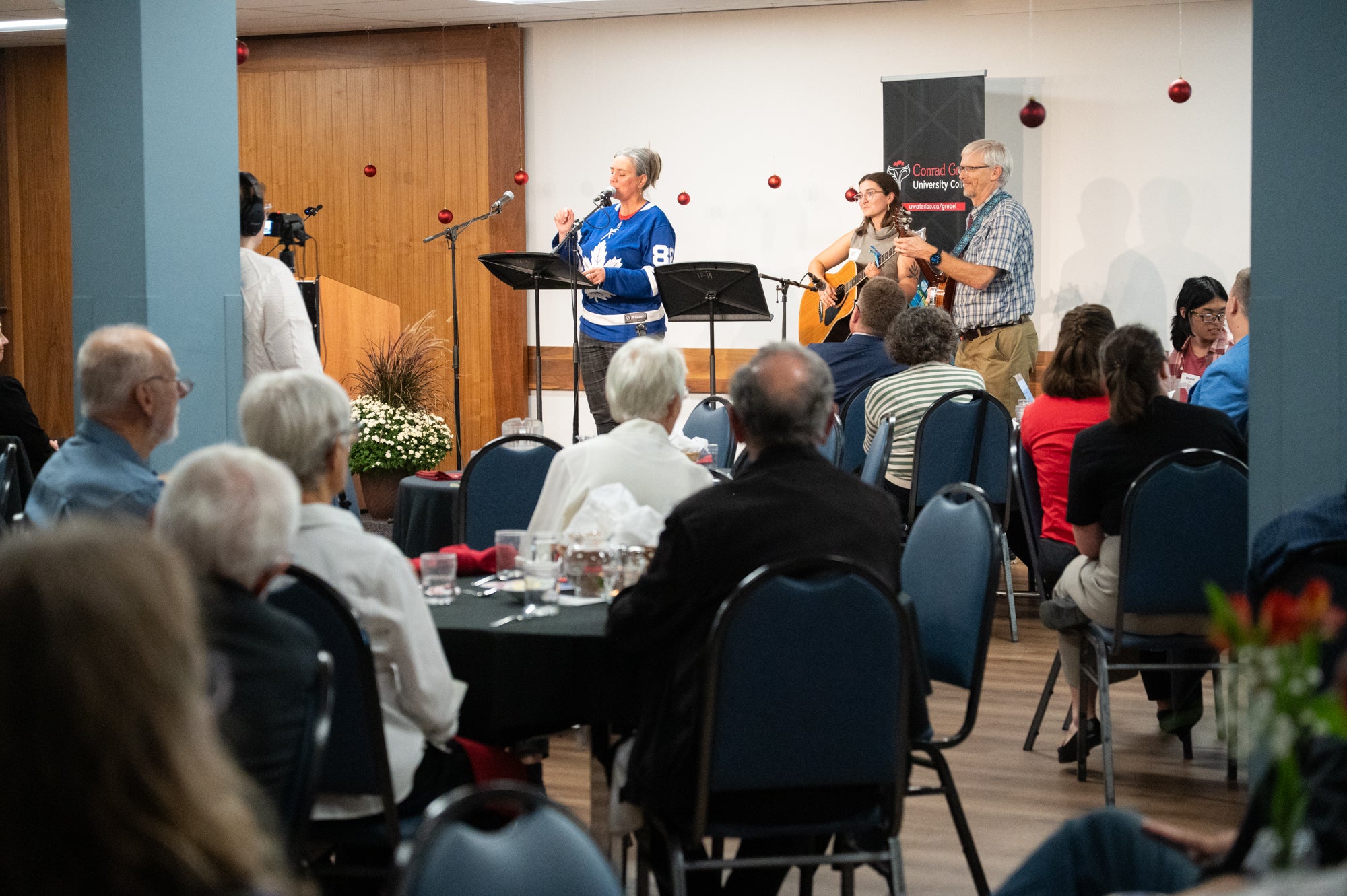 Alison and friends sing at Fred's retirement