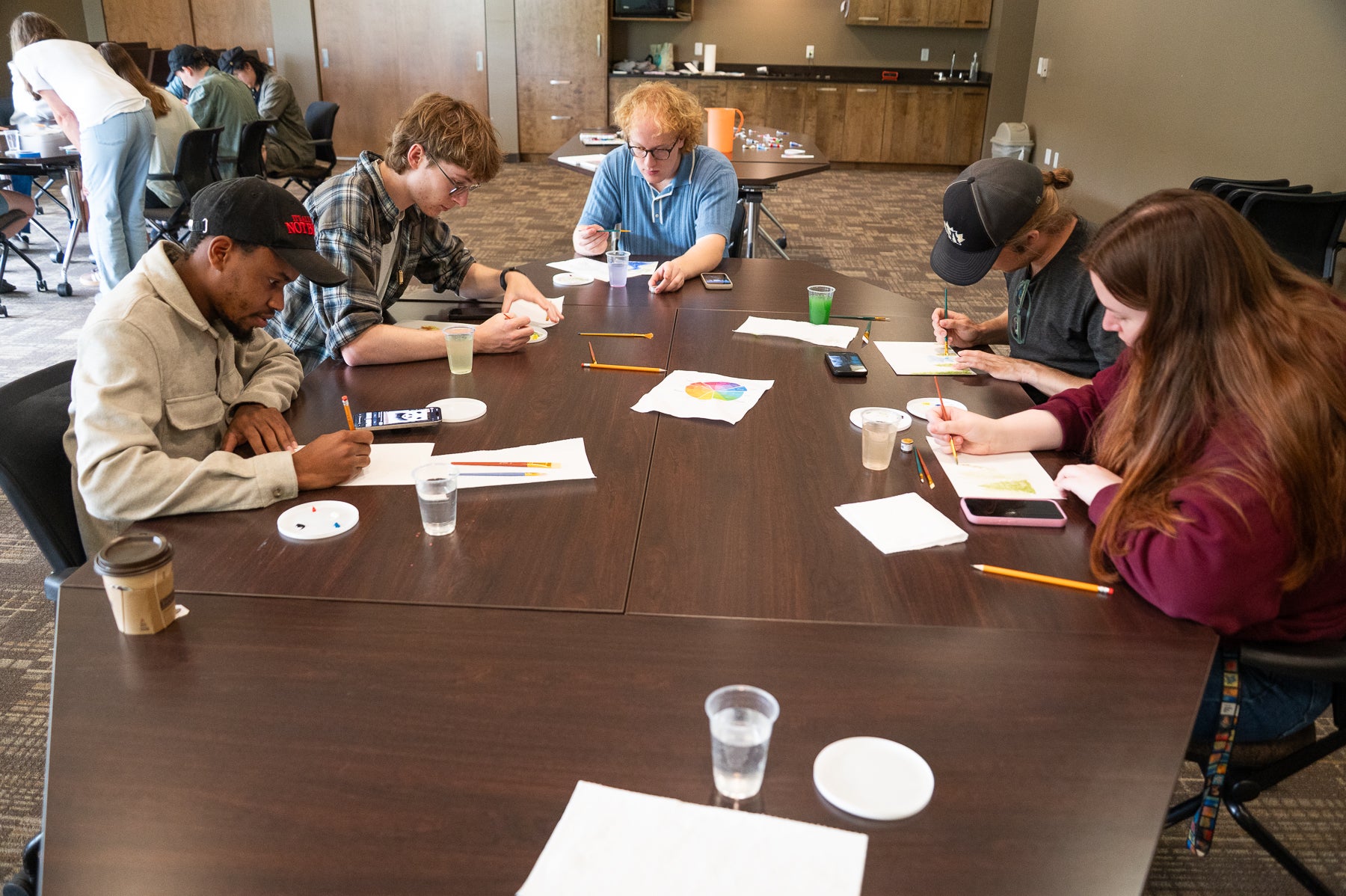 Students paint with watercolours