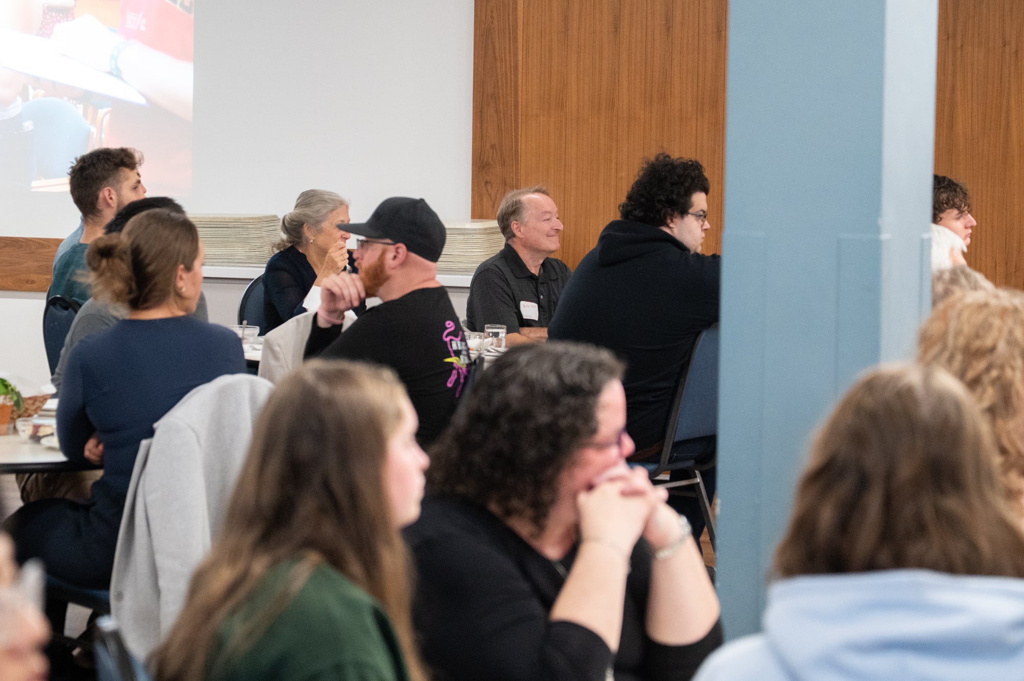 Peter Hart, a retiring custodian at Grebel, among the Grebel dinner guests