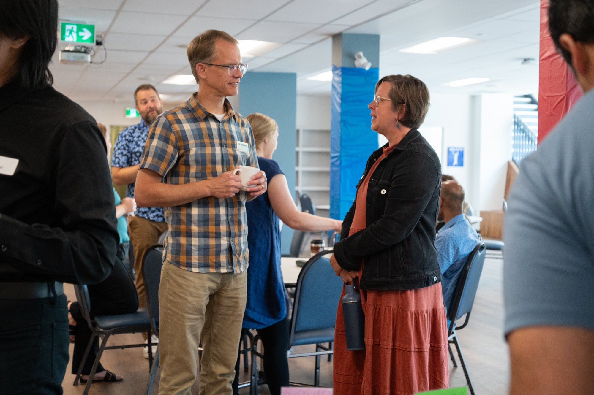 Paul Heidebrecht speaks to a graduate student