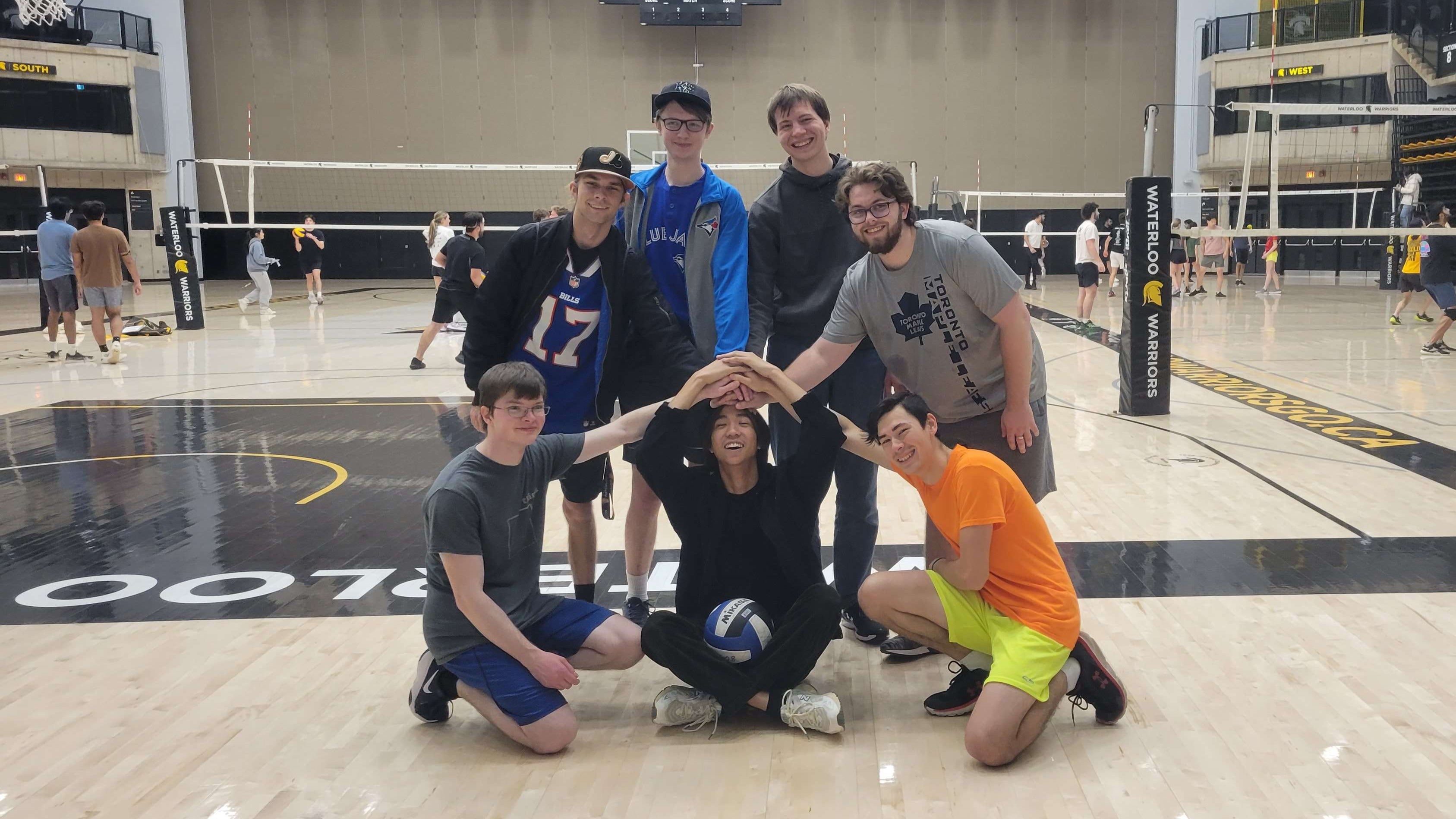 intramural team on a volleyball court