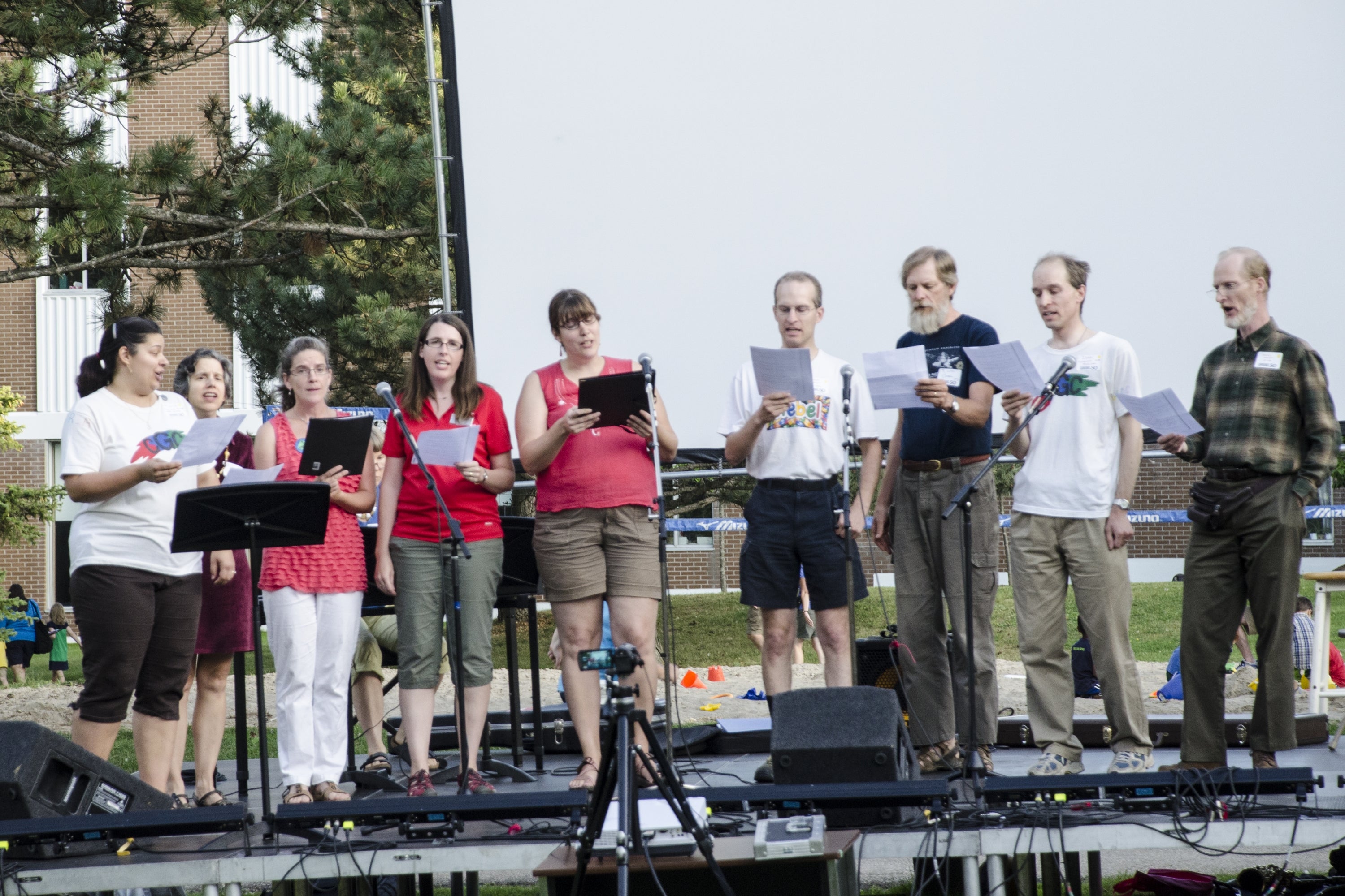 people on an outdoor stage