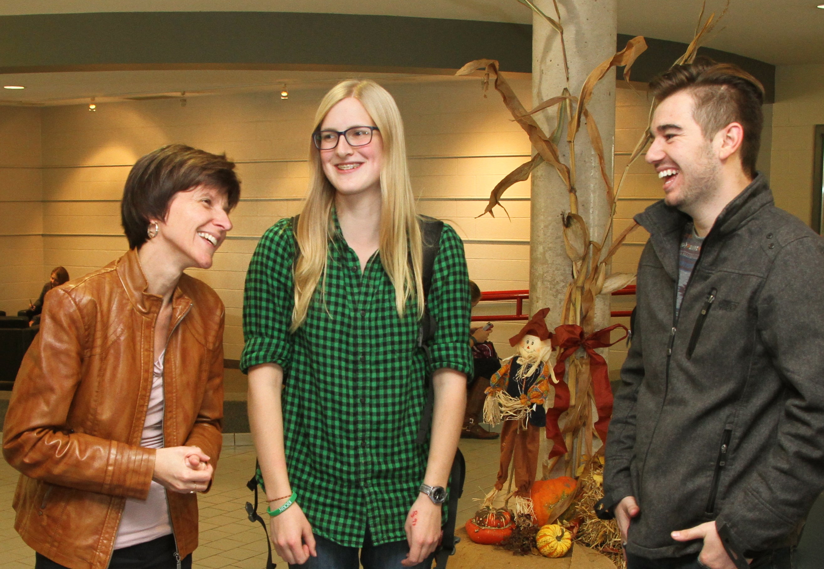   Ann Schultz visits with some of her students at Rockway Mennonite Collegiate