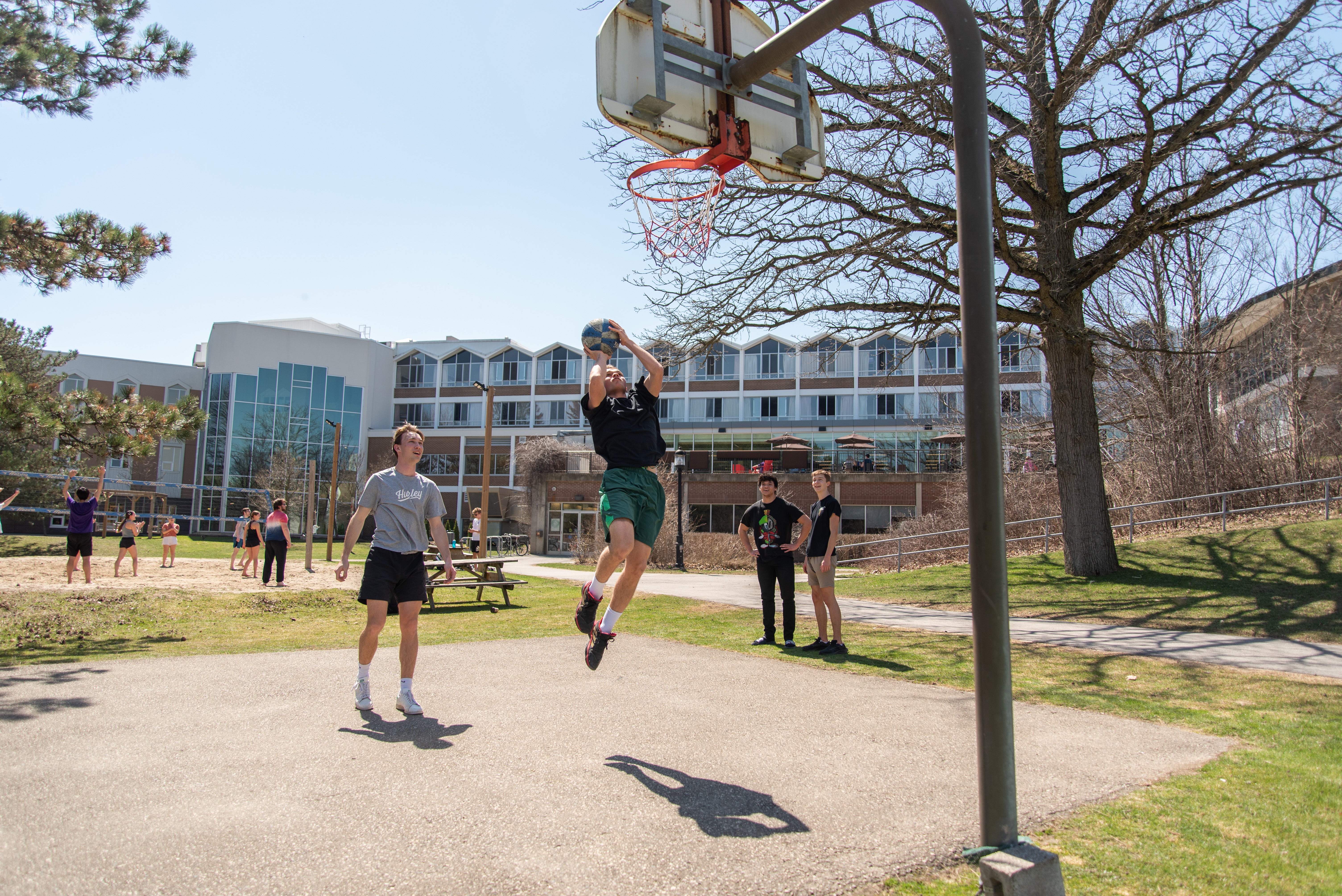 students playing basketball