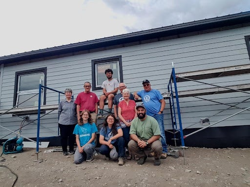 Isabel Song and the MDS crew outside a house in Lytton