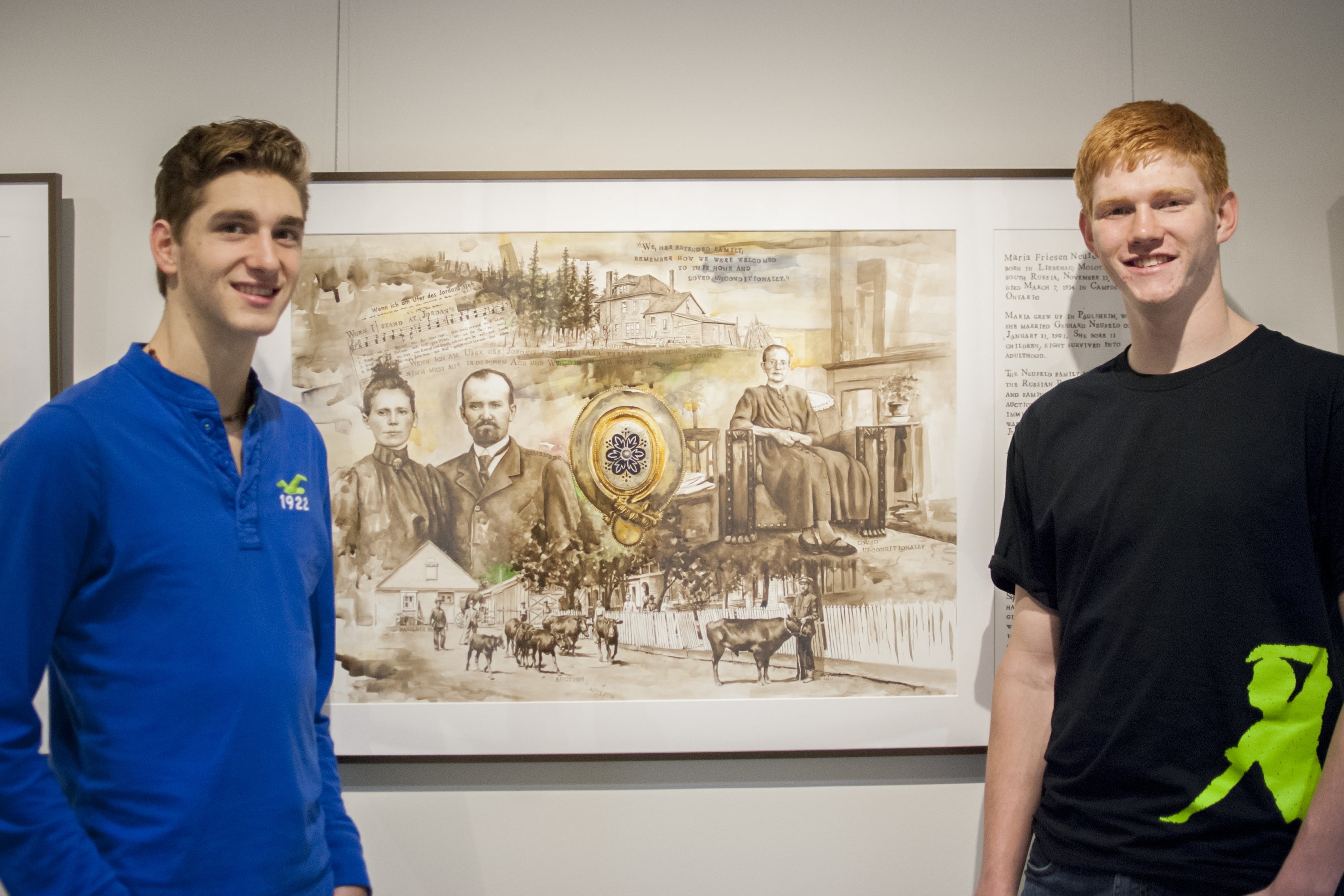 Students Adrian Neufeld and Noah Janzen stand with the painting of their great-great-grandmother, Maria Neufeld.