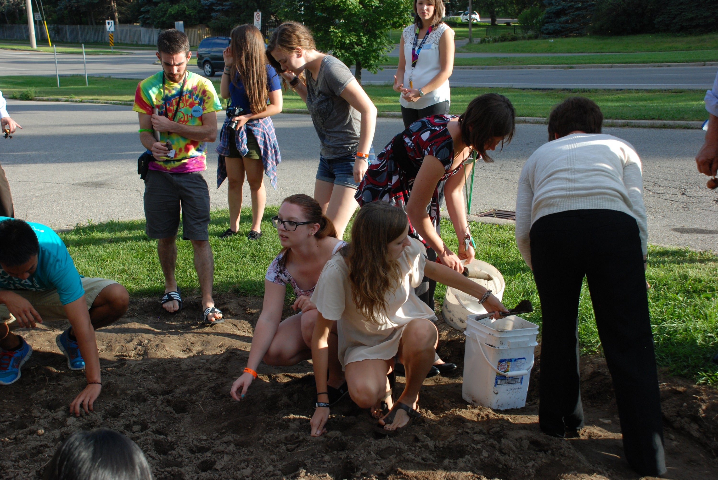 Students planting tulips