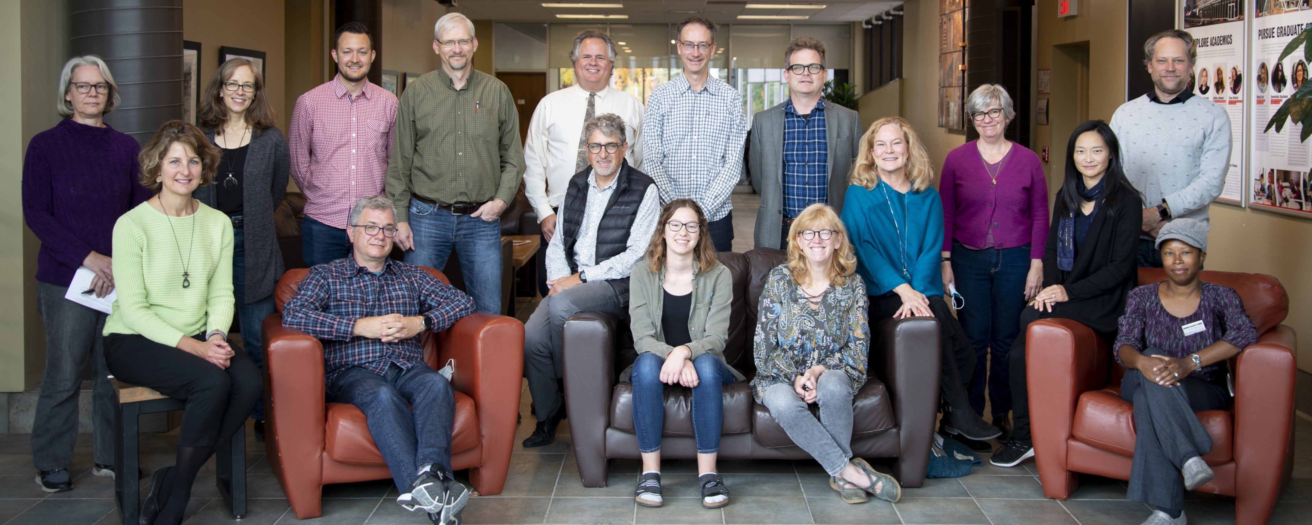 Fall 2022 College faculty gathered in a group for a photo in Grebel Atrium