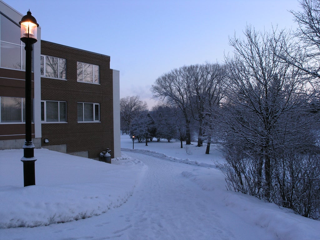 A snowy path outside Grebel building