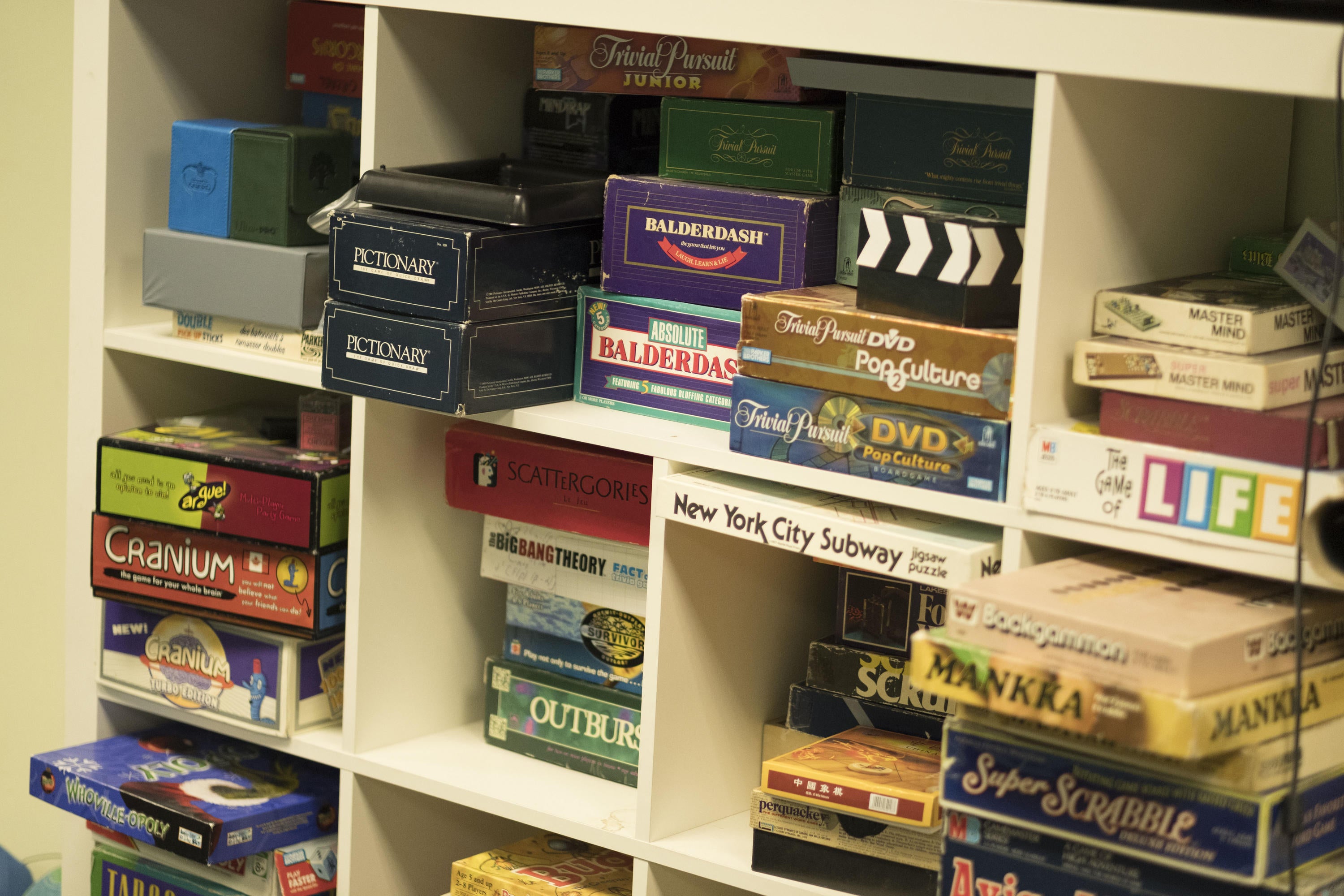 A shelving unit holding many different board games in Grebel games lounge 