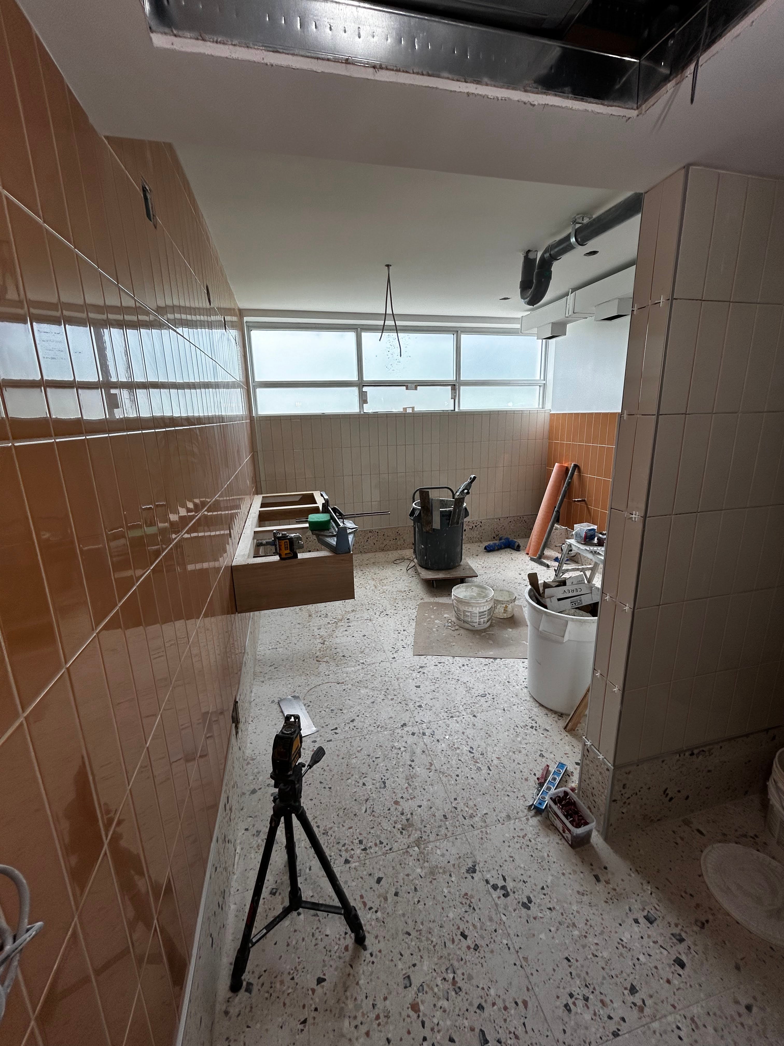 Washroom construction update, tiles laid