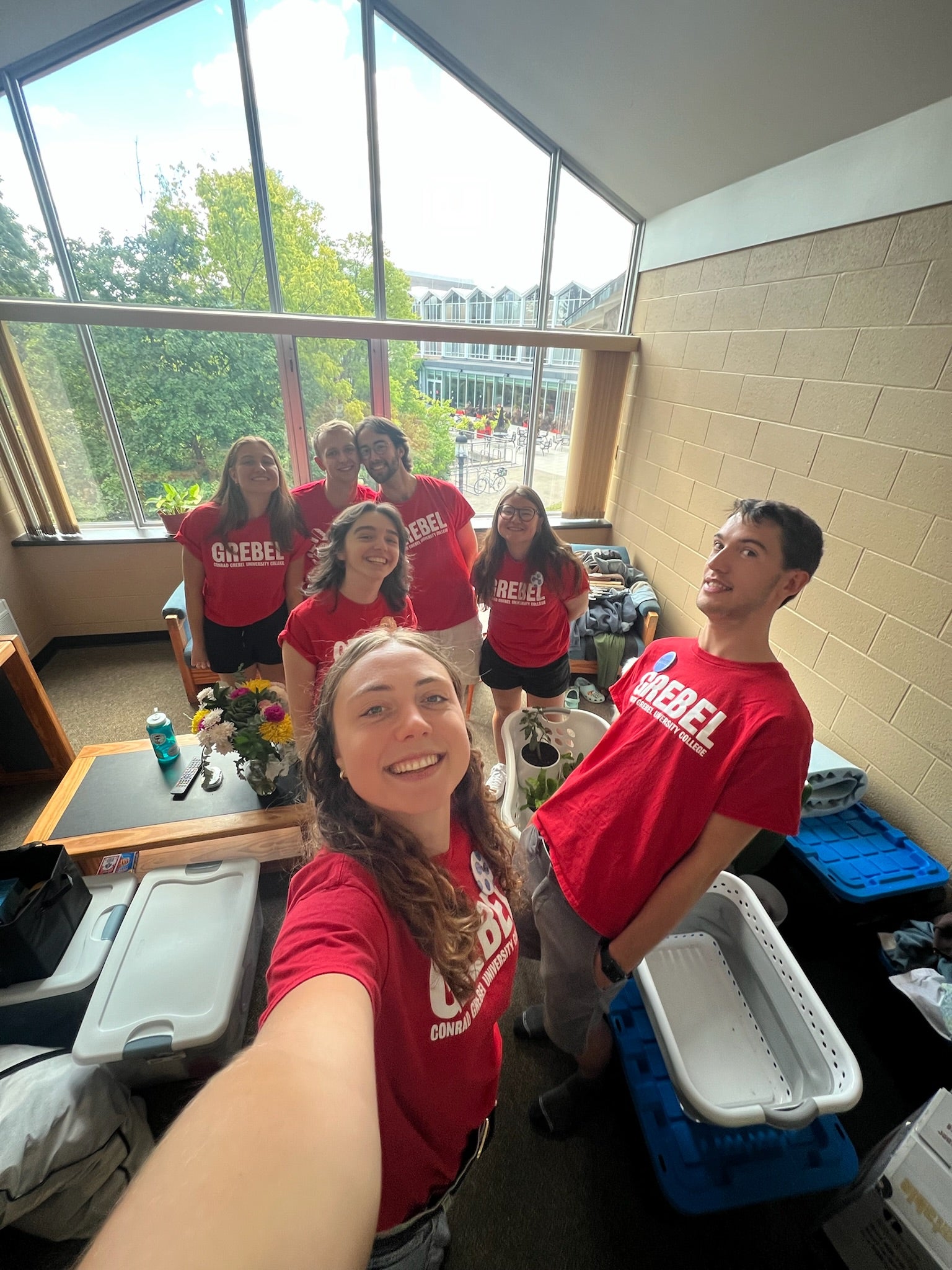 Group of students wearing Grebel t-shirts