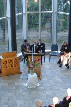 John speaking at the atrium in Conrad Grebel University College