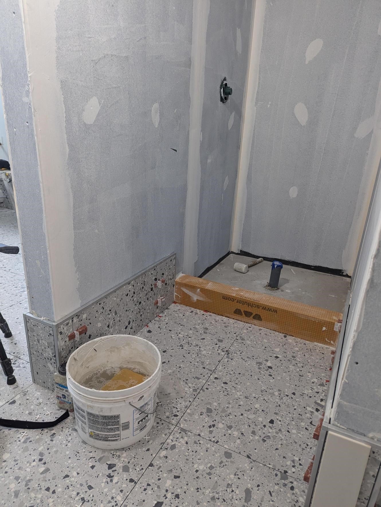 The shower floor tiles places