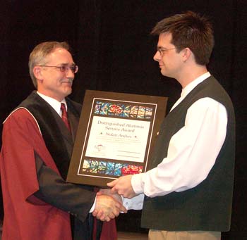 Nolan Andres receiving Grebel’s 2006 Distinguished Alumni Service Award