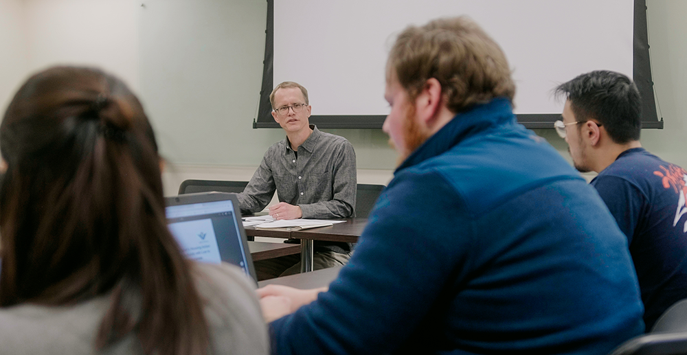 Paul H teaches a class in the centre for peace advancement