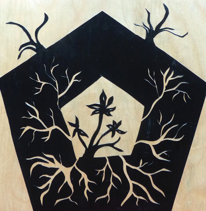 Black hexagonal shape with plants growing out of it.