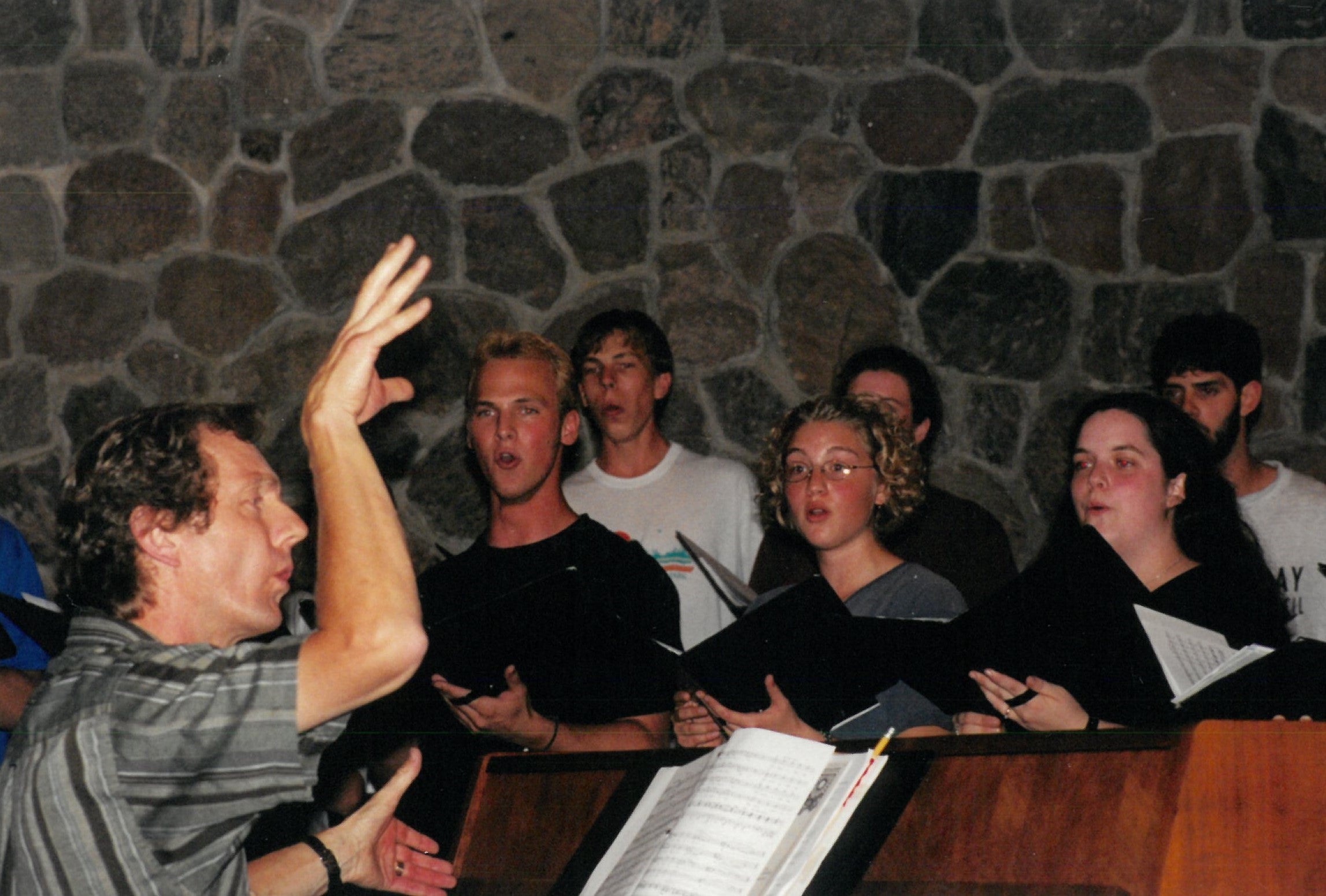 Students singing in the Chapel