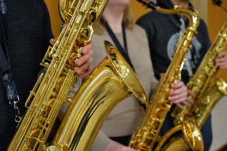 Three saxophones