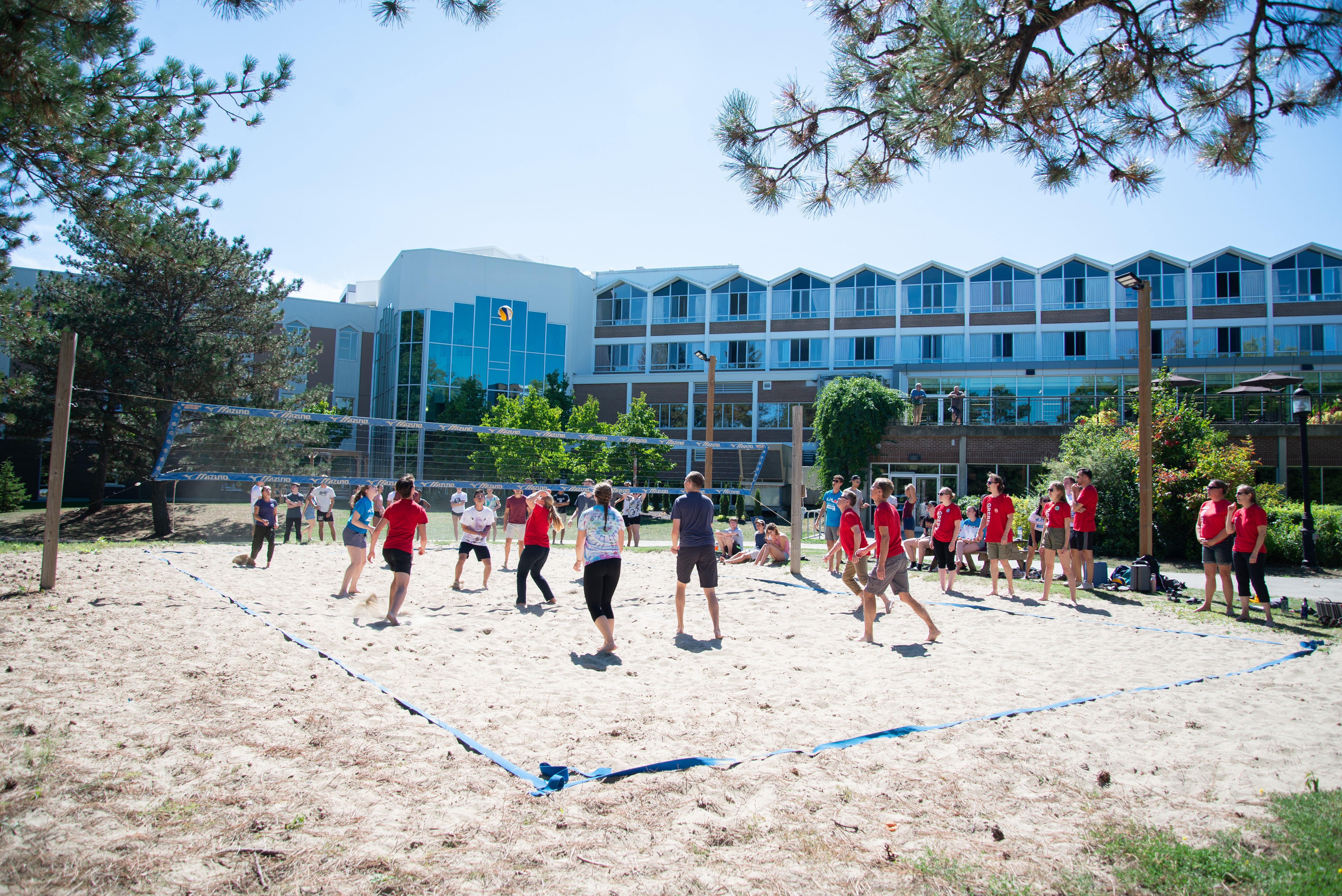 students playing volleyball