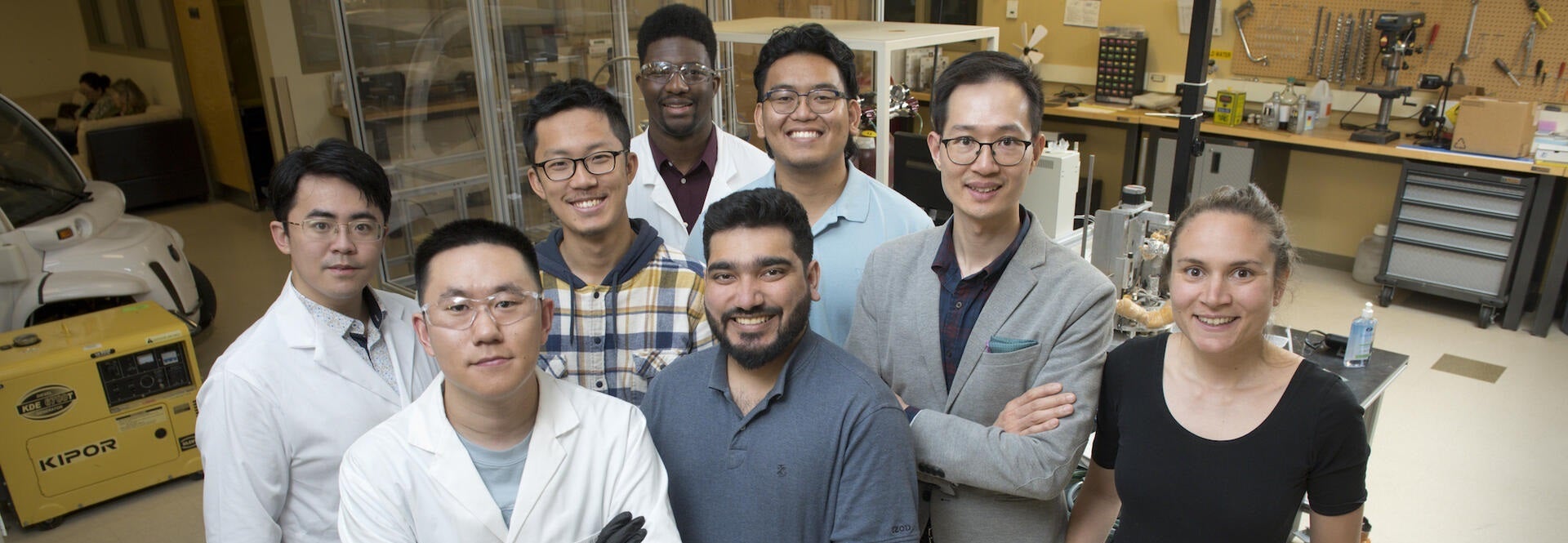 A group of researchers posed in the lab