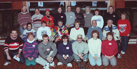 Group photo of curlers in lounge.