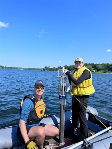 collecting a sediment core from Conestogo Lake