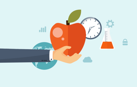 Hand holds apple next to a clock.