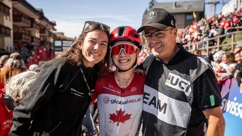 Rob Holmgren and daughters celebrate at MTB Worlds finish line.