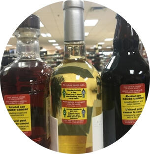 ​Health warning labels on alcohol bottles.