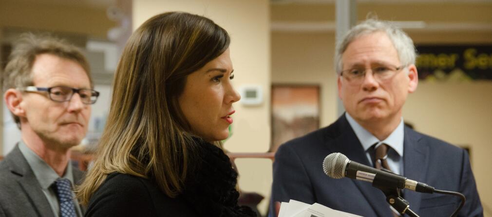 ​Erin Hobin speaking in a microphone.