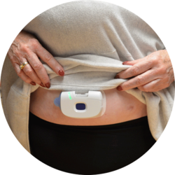 ​At-home wearable placed on abdomen. 