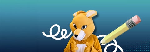 Health mascot ahssie the kangaroo draws with large pencil.