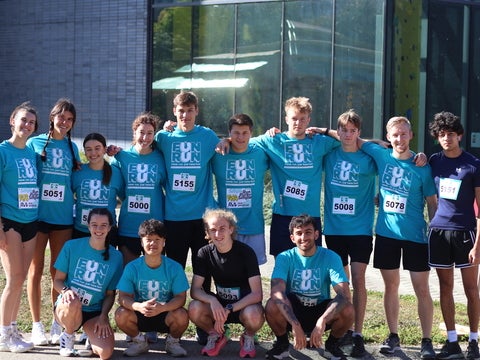 Group of students wearing "Fun Run" T-shirts
