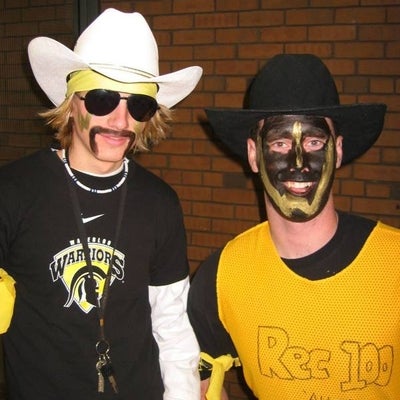 Two male participants with costumes and face painting