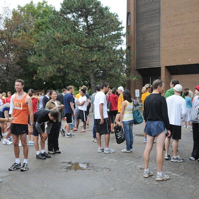 People gathering in front of Applied Health Sciences building before the race