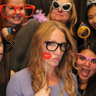 Attendees in photo booth with Heather Moyse