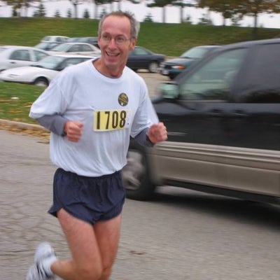 A man running smiling