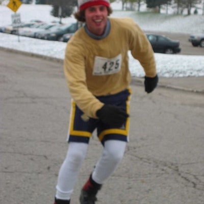 A male participant riding roller blades.