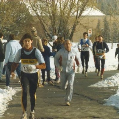 Participants of Fun Run race running.