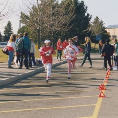 Two female runners running the race.