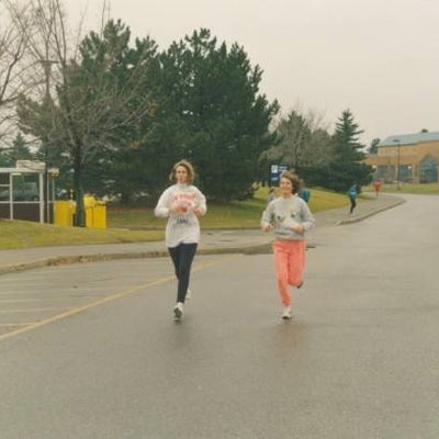 Two female participants running.