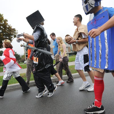 People running in various costumes